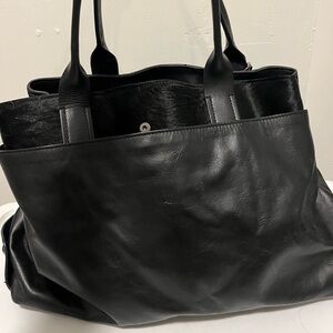 A Bellucci NWOT black leather shoulder bag Made in Italy, red interior